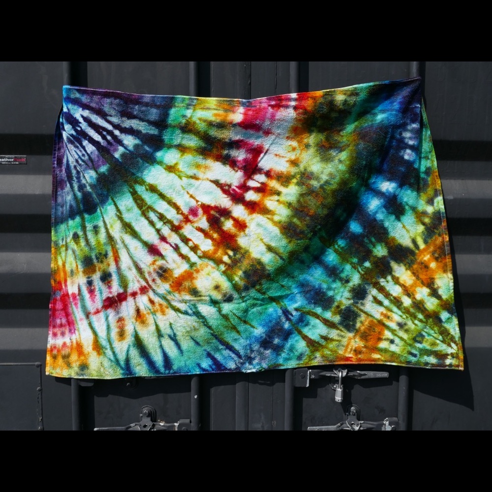 Rainbow tie-dyed beach towel